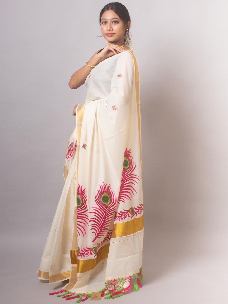 Kerala Onam Kasavu Saree with Peacock Feather Print